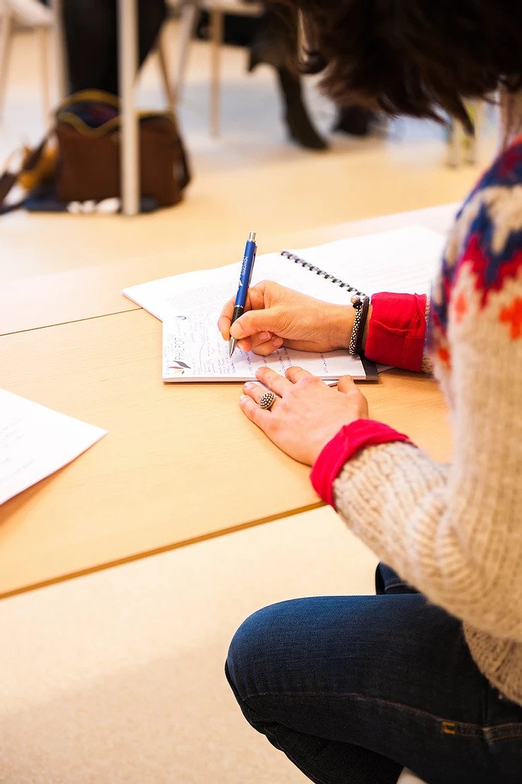 woman writing notes