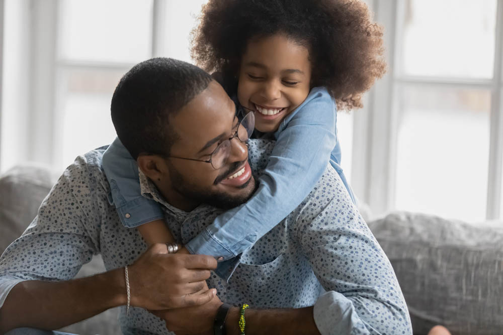 Father and daughter playing