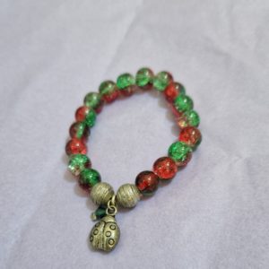 Beaded silver plated ladybird charm bracelet